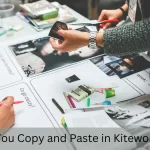 People working on a project with images and documents, symbolizing collaboration and file management, asking the question: Can you copy and paste in Kiteworks?