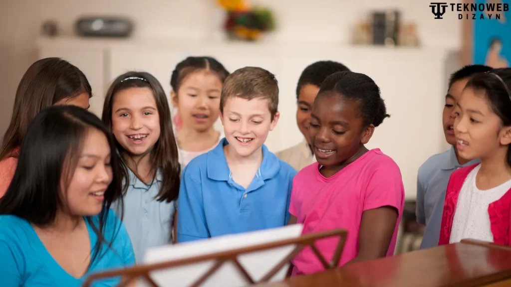 Children singing happily in a group, learning together in a vibrant preschool environment.