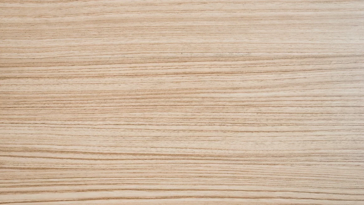 Light wood grain pattern showcasing aesthetic properties of white oak, commonly used for furniture, flooring, and decor.