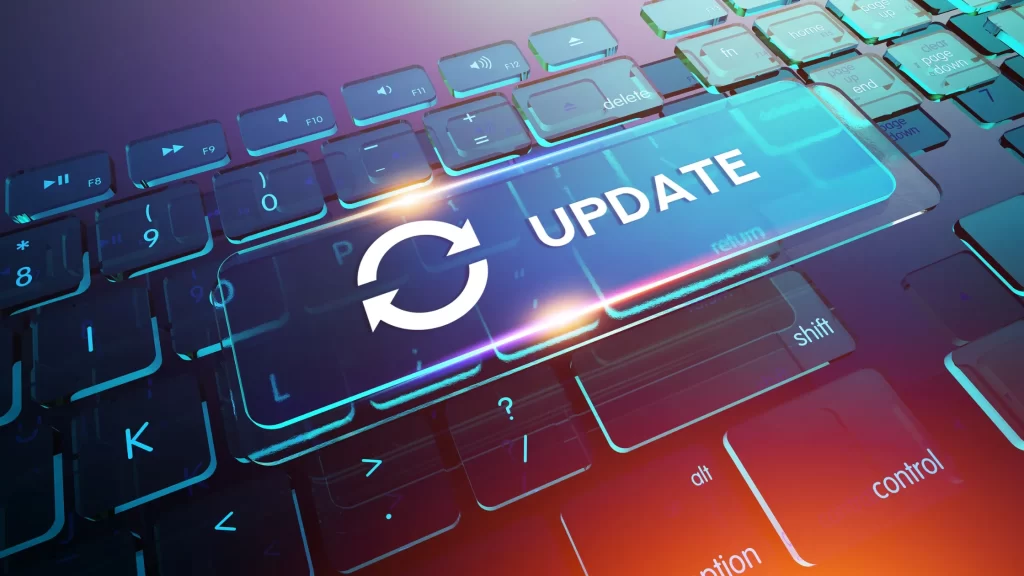 Modern keyboard with 'Update' key highlighted, symbolizing digital updates on ScoopUpdates.com.